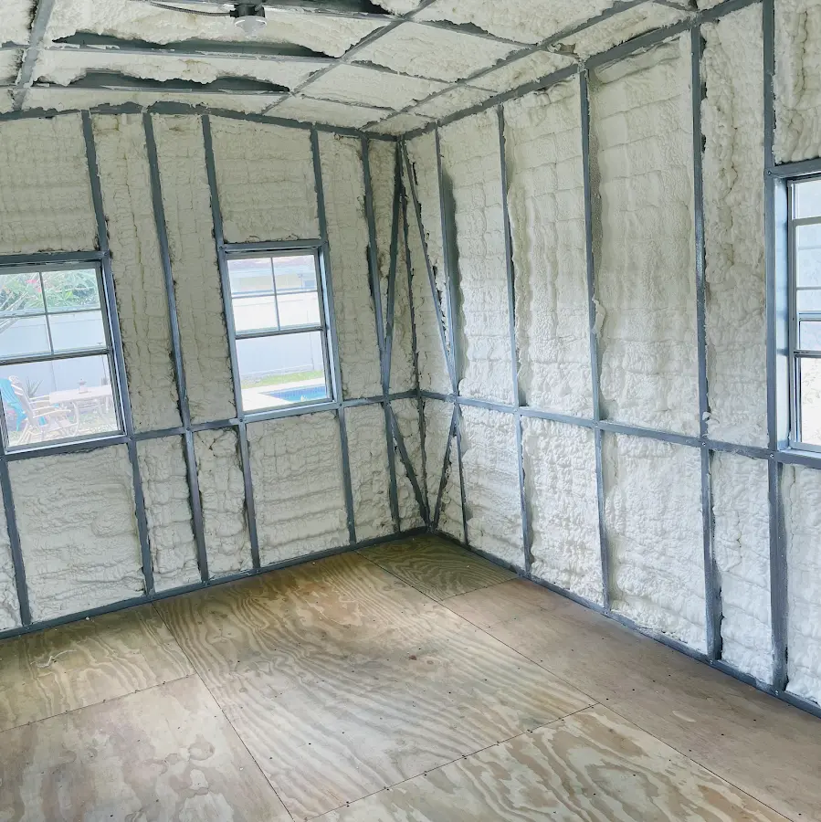 Closed-cell spray foam insulation applied to wall cavities in a residential project in Parker