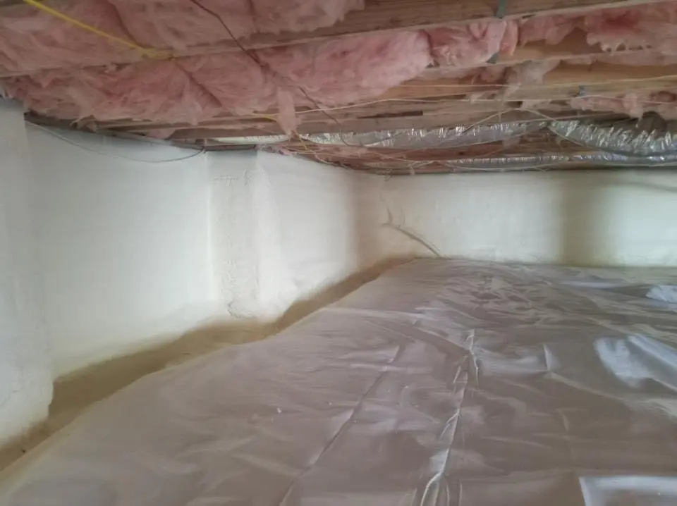 Crawl space encapsulation with closed-cell spray foam for Commercial Roof Restoration in Parker